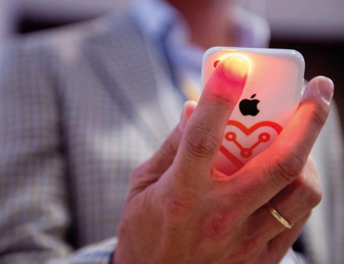 Participant using the HEART app on a smartphone