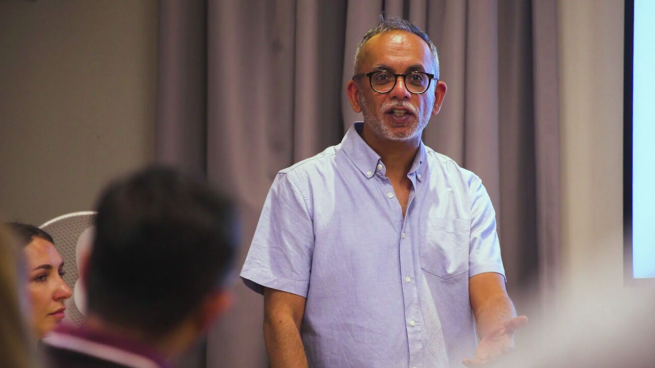 Ravi speaking during a workshop